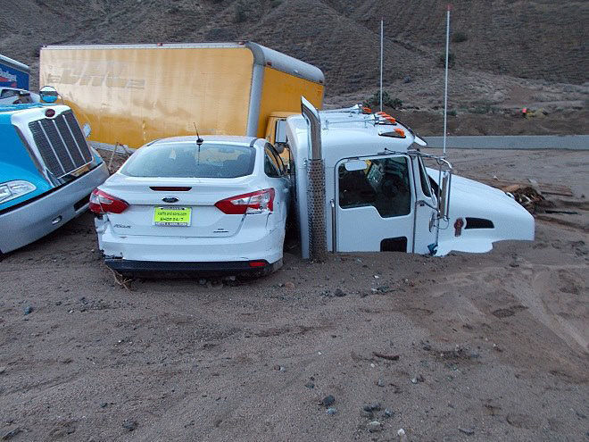 Semi submerged after mudslide